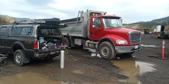 John's JANTECH service truck on a Vernon-area job site with the full mobile A/C setup