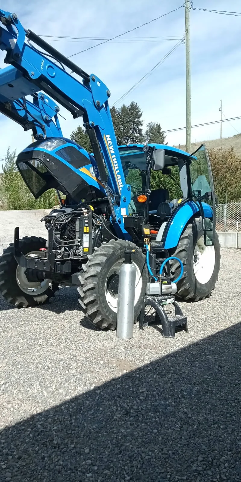 JANTECH on-site mobile A/C recharge and diagnostic on a New Holland tractor in the Okanagan